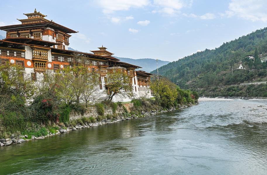 Punakha Dzong on the River — Sacred Fortress of Bhutan — Fine art canvas print by Naomi McLeod