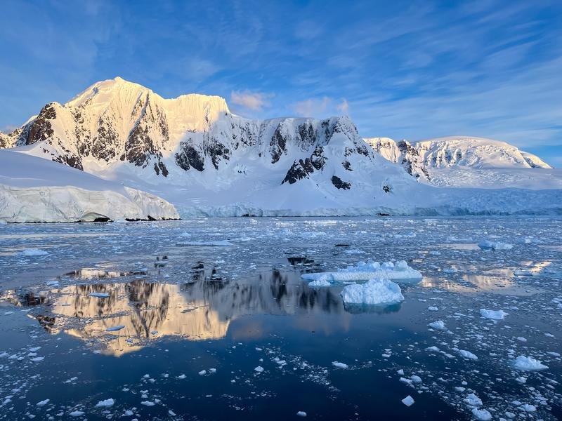 Golden Hour on the Antarctic Peninsula — Sea Ice and Mountains — Fine art canvas print by Naomi McLeod