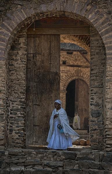 Orthodox Pilgrim — Ancient Church Doorway, Ethiopia — Fine art canvas print by Naomi McLeod