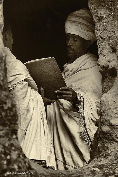 The Reader — Ethiopian Priest at Lalibela, Ethiopia — Fine art canvas print by Naomi McLeod