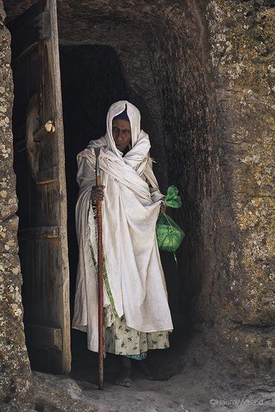 Pilgrim at Lalibela — Ethiopian Orthodox Sacred Site — Fine art canvas print by Naomi McLeod