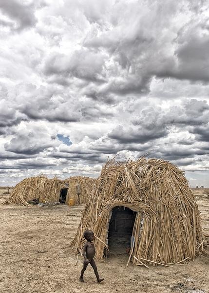 Child of the Omo Valley — Traditional Dassanech Village, Ethiopia — Fine art canvas print by Naomi McLeod