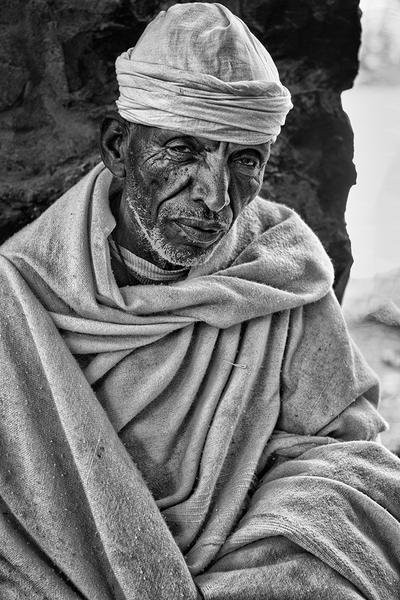 Orthodox Pilgrim — Lalibela, Ethiopia | Portrait of Faith — Fine art canvas print by Naomi McLeod