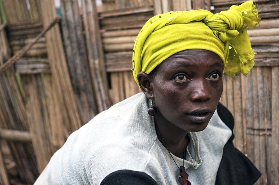 Eyes of Ethiopia — Portrait of a Young Woman in Yellow Headwrap — Fine art canvas print by Naomi McLeod