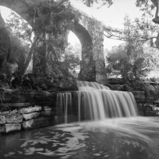 Stone Bridge Waterfall — Timeless Monochrome Landscape