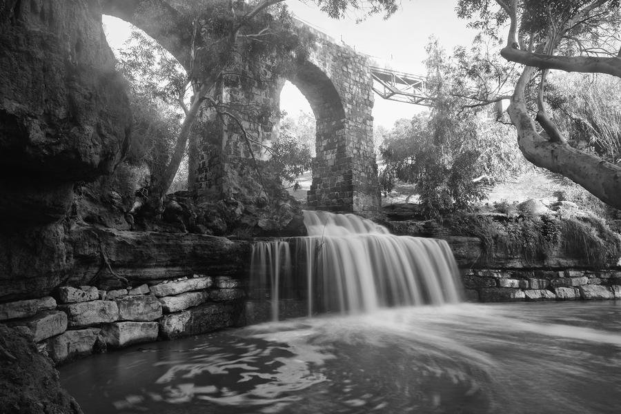 Stone Bridge Waterfall — Timeless Monochrome Landscape — Fine art canvas print by Naomi McLeod