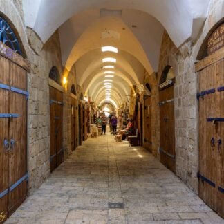Ancient Vaulted Market Corridor with Wooden Doors