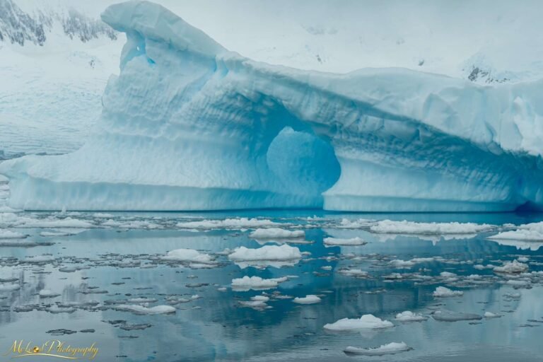 Antarctic Iceberg Arch with Glacial Blue Waters Fine Art Print