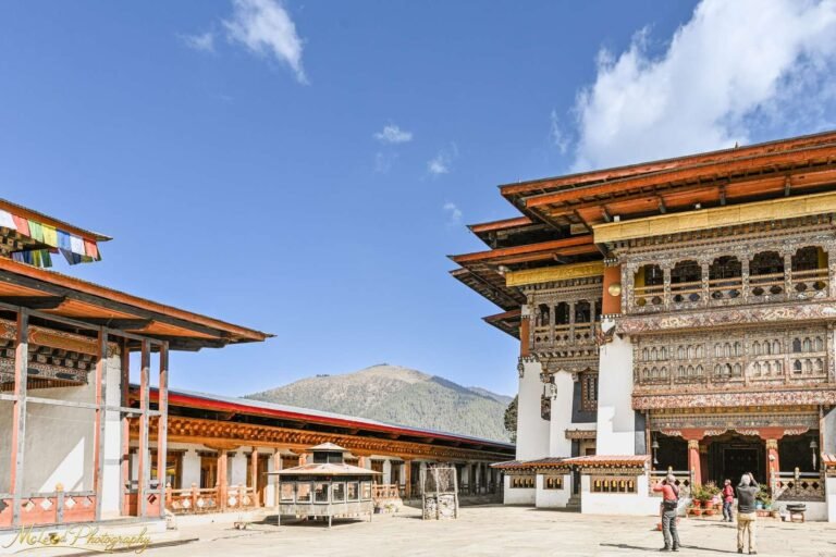 Bhutanese Dzong Monastery Courtyard with Himalayan Mountains