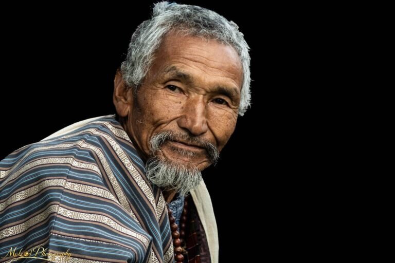 Bhutanese Elder Portrait in Traditional Gho Robe