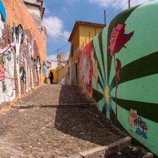 Vibrant Street Art Alley in Portugal Cobblestone Walkway