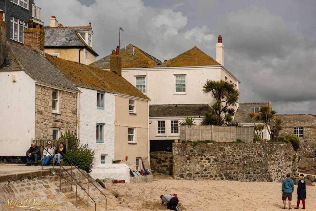 Historic Cornish Seaside Cottages with Sandy Beach Wall Art — Fine art canvas print by Naomi McLeod