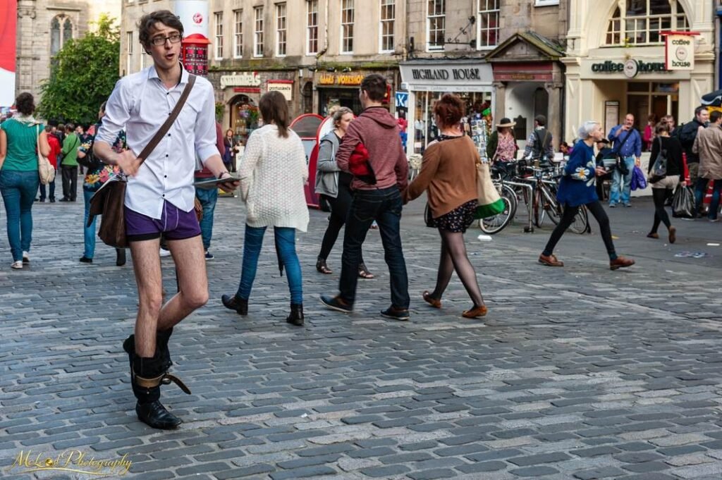 Edinburgh Fringe Festival Street Performer on Royal Mile — Fine art canvas print by Naomi McLeod