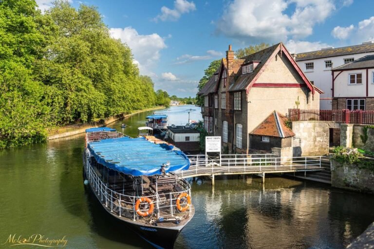 English River Boat Moored at Historic Village Waterfront