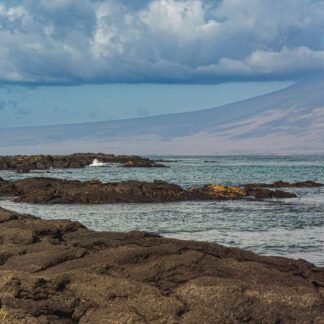 Galapagos Volcanic Shoreline with Distant Island Vista