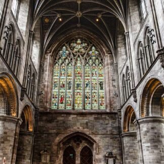 Gothic Cathedral Interior with Stunning Stained Glass Window