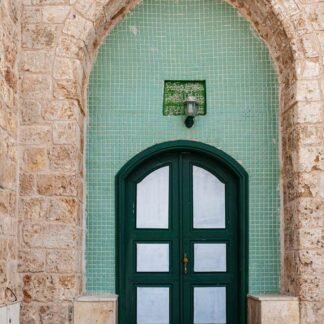 Green Arched Doorway in Jerusalem Old City Stone Wall