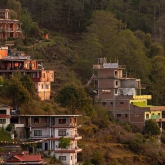 Himalayan Hillside Village with Prayer Flags at Dusk