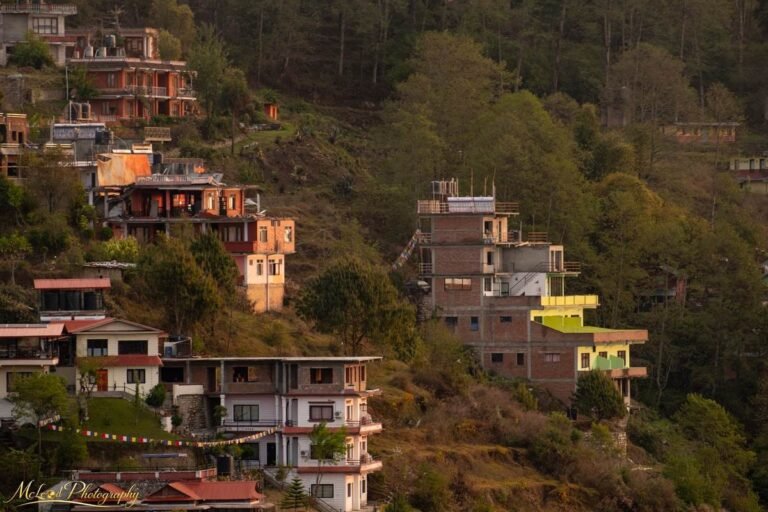 Himalayan Hillside Village with Prayer Flags at Dusk