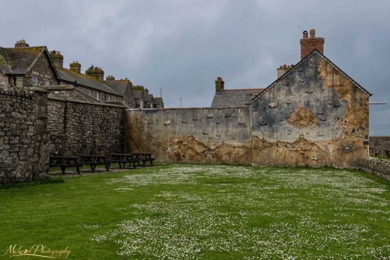 Historic Maritime Mural on Portland Stone Village Wall