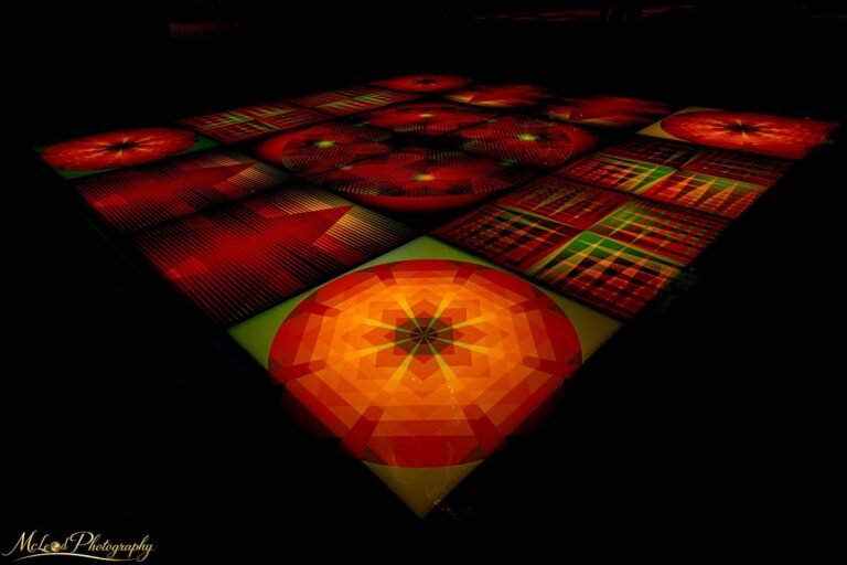 Vibrant Geometric Light Art Installation Glowing in Darkness