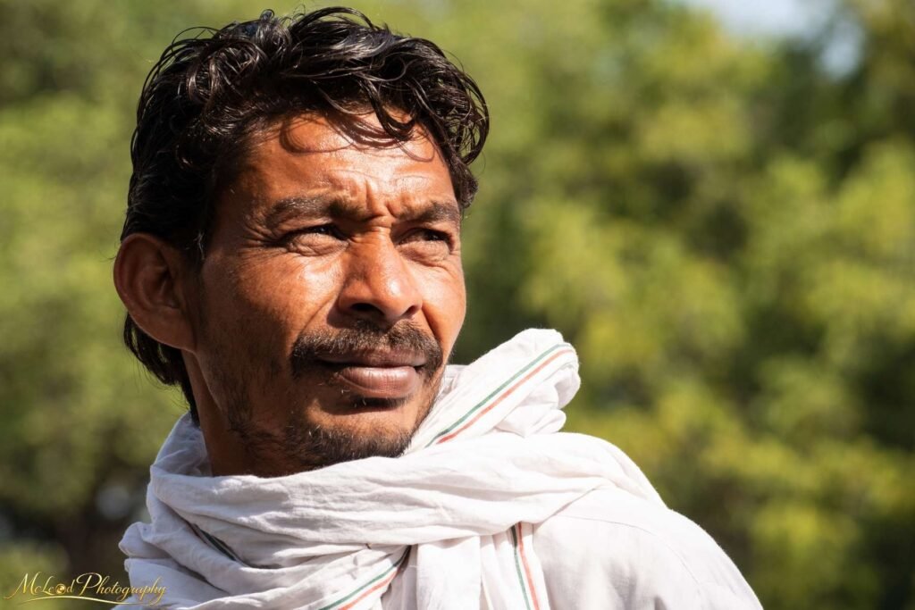 Indian Man Portrait with Traditional White Scarf | Rural India — Fine art canvas print by Naomi McLeod