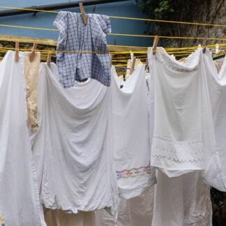 Italian Clothesline with White Linens and Red Roses