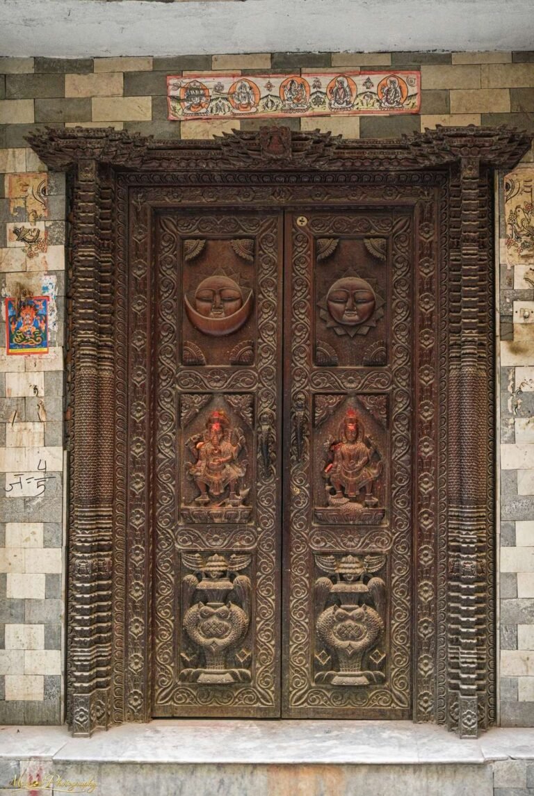 Ancient Nepalese Temple Door with Sun Moon Carvings