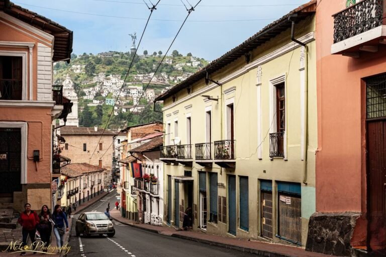 Quito Old Town Colonial Street with El Panecillo Virgin Statue