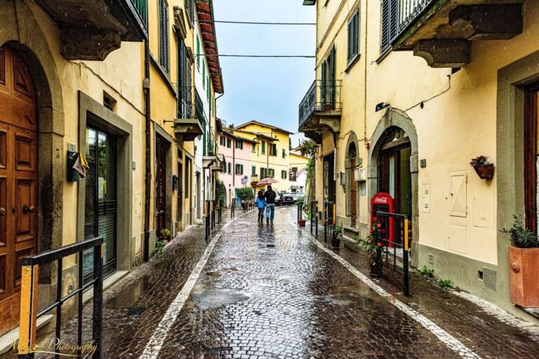Rainy Tuscan Village Street Cobblestone Reflections Italy