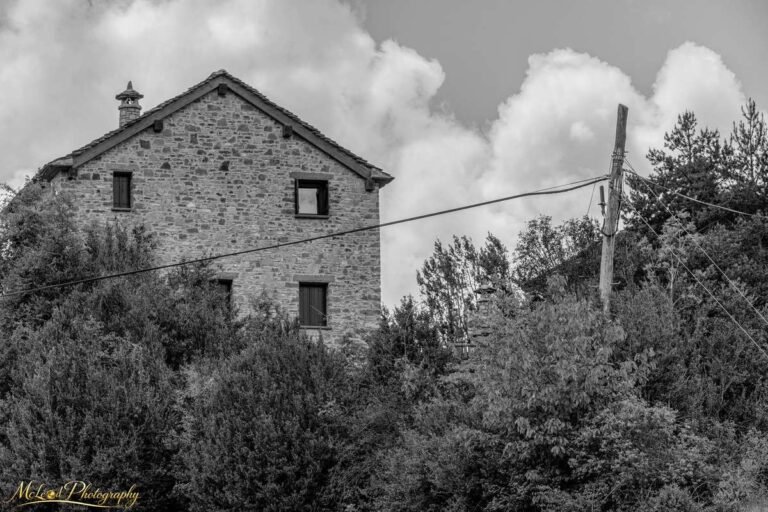 Rustic Stone Farmhouse in European Countryside Black White