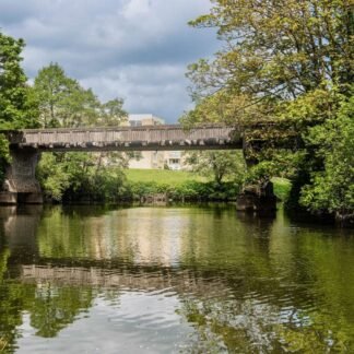 Historic Wooden Bridge Over Scottish River Canvas Print