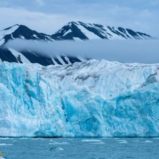 Majestic Blue Glacier Wall with Arctic Mountains Svalbard