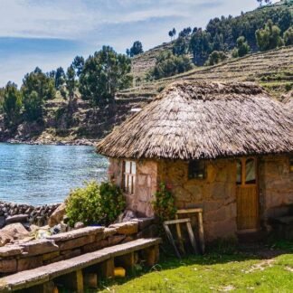Traditional Thatched Stone Cottage on Lake Titicaca Shore