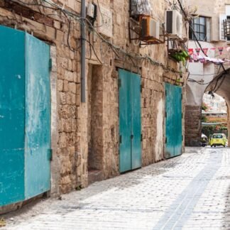 Turquoise Doors in Ancient Stone Alley Old Jaffa Israel