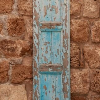 Rustic Turquoise Shutter on Ancient Stone Wall Art Print