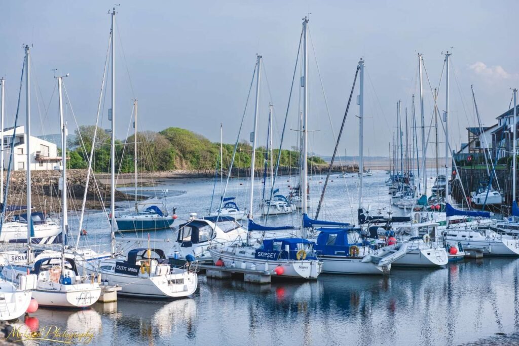 Serene Welsh Marina Sailboats at Rest in Calm Harbor — Fine art canvas print by Naomi McLeod