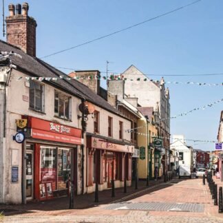 Charming Welsh High Street with Colorful Bunting