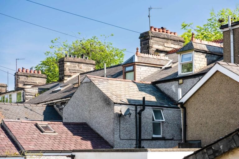 Welsh Village Rooftops with Slate Tiles and Stone Chimneys